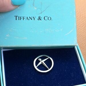 Tiffany and company man power pin